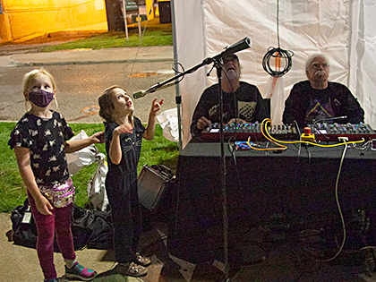 Henry Birdseye and Wayne Gillis running Laser Karaoke with young ladies at DLECTRICITY